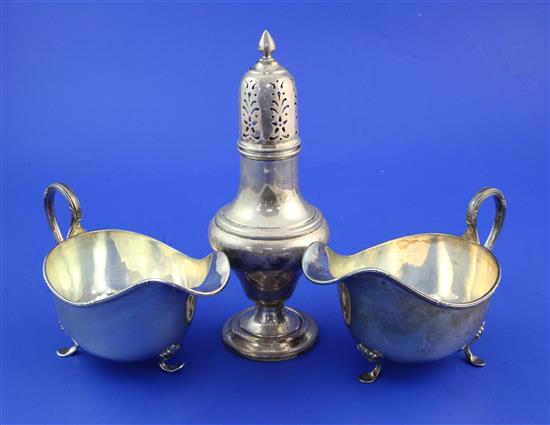 A pair of George V silver sauceboats & a sugar caster, 12.5 oz.